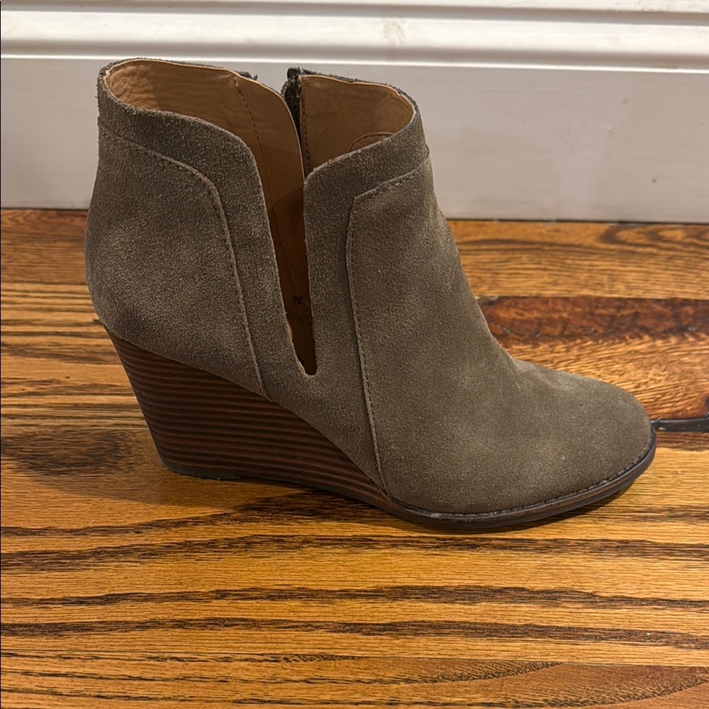 Tan wedge ankle boot with suede upper and V-shaped opening